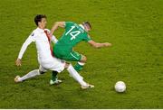 29 March 2015; Jon Walters, Republic of Ireland, is fouled by Lukasz Szukala, Poland. UEFA EURO 2016 Championship Qualifier, Group D, Republic of Ireland v Poland. Aviva Stadium, Lansdowne Road, Dublin. Picture credit: Brendan Moran / SPORTSFILE