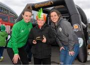 29 March 2015; Continental Tyres women’s national league and Irish women’s national team and UCD Waves players Sarah Cluine and Karen Duggan were at the Aviva Stadium for the Republic of Ireland v Poland game today. The two Irish Internationals challenged fans going to the match to a penalty shoot out compeititon outside the stadium in association with Continental Tyres, proud supporters of Irish womens soccer and official partner of the FAI. Pictured are Andrew Walsh, aged twelve, from Kildare, with UCD Waves players Sarah Cluine, right, and Karen Duggan.  For more infortmation on Continental Tyres visit www.continental-tyres.com. Aviva Stadium, Lansdowne Road, Dublin. Picture credit: Pat Murphy / SPORTSFILE