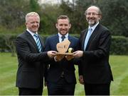 2 April 2015; Kilkenny hurler and past student of DCU Richie Hogan is presented with a trophy to honor his outstanding achievements whilst a student in DCU by Professor Brian MacCraith, President of DCU, right, and Michael Kennedy, Director of DCU GAA Academy. DCU, Glasnevin, Dublin. Picture credit: Matt Browne / SPORTSFILE