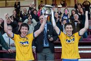4 April 2015; Roscommon joint captains Cathal Compton and Tadhg O'Rourke celebrate with the J.J .Fahy cup after beating Galway in the Final. EirGrid Connacht U21 Football Championship Final, Galway v Roscommon. Tuam Stadium, Tuam, Co. Galway. Picture credit: Ray Ryan / SPORTSFILE