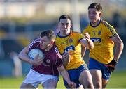 4 April 2015; Damien Comer, Galway, in action against Evan McGrath and Sean Mullooly, Roscommon. EirGrid Connacht U21 Football Championship Final, Galway v Roscommon. Tuam Stadium, Tuam, Co. Galway. Picture credit: Ray Ryan / SPORTSFILE