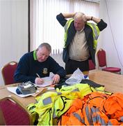 5 April 2015; Presentation committee member Sean McKeown, left, Navan O'Mahonys G.A.A. Club, with 'Maor' Peter Cassidy, St Michaels GFC, as they prepare for the game. Allianz Football League, Division 2, Round 7, Meath v Cavan. Páirc Táilteann, Navan, Co. Meath. Picture credit: Ray McManus / SPORTSFILE