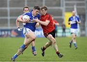 5 April 2015; John O'Loughlin, Laois, in action against Luke Howard, Down. Allianz Football League, Division 2, Round 7, Down v Laois. PÃ¡irc Esler, Newry, Co. Down. Picture credit: Mark Marlow / SPORTSFILE