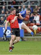 5 April 2015; John O'Loughlin, Laois, in action against Kevin McKernan, Down. Allianz Football League, Division 2, Round 7, Down v Laois. PÃ¡irc Esler, Newry, Co. Down. Picture credit: Mark Marlow / SPORTSFILE