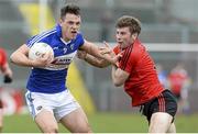 5 April 2015; John O'Loughlin, Laois, in action against Luke Howard, Down. Allianz Football League, Division 2, Round 7, Down v Laois. Páirc Esler, Newry, Co. Down. Picture credit: Mark Marlow / SPORTSFILE