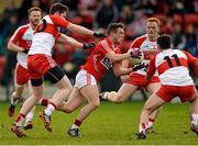 5 April 2015; John O'Rourke, Cork, in action against Emmett Bradley and Daniel Heavron, Derry. Allianz Football League, Division 1, Round 7, Derry v Cork. Owenbeg, Derry. Picture credit: Oliver McVeigh / SPORTSFILE