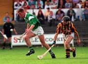 24 August 1997; Ciaran Carey of Limerick gets away from D.J. Carey of Kilkenny during the Church & General National Hurling League Semi-Final at Nowlan Park in Kilkenny. Photo by David Maher/Sportsfile