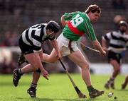 28 February 1998; Daithi Regan of Birr in action against Stephen Sheedy of Clarecastle during the AIB All-Ireland Club Hurling Championship Semi-Final Replay match between Birr and Clarecastle at Semple Stadium in Thurles, Tipperary. Photo by Ray McManus/Sportsfile