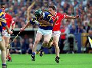 2 July 2000; David Kennedy of Tipperary in action against Alan Browne of Cork during the Guinness Munster Senior Hurling Championship Final between Cork and Tipperary at Semple Stadium in Thurles, Tipperary. Photo by Ray McManus/Sportsfile
