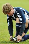 23 April 2008; Hooker Jerry Flannery ties his boots before a training session ahead of their Heineken cup game against Saracens. Munster Rugby Squad Training, University of Limerick, Limerick. Picture credit: Ray McManus / SPORTSFILE