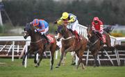 24 April 2008; Blazing Bailey, with Robert Thornton up, centre, races ahead of second place Refinement, with Tony McCoy up, left, and eventual fourth Cooldine, with Ruby Walsh up, on their way to winning the Ladbrokes.com World Series Hurdle. Irish National Hunt Festival. Punchestown Racecourse, Co. Kildare. Picture credit; Brian Lawless / SPORTSFILE