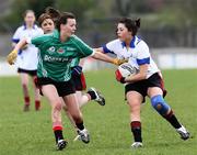 24 April 2008; Tara Henry, Scoil Muire agus Padraig, in action against Ellie Purcell, De La Salle. Pat the Baker Post Primary School Junior C Final, Scoil Muire agus Padraig, Swinford v De La Salle, Carlow, Pairc Ciaran, Athlone. Picture credit: Oliver McVeigh / SPORTSFILE