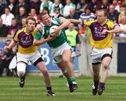 27 April 2008; Shane McDermott, Fermanagh, in action against Eric Bradley and Philip Wallace, Wexford. Allianz National Football League, Division 3 Final, Wexford v Fermanagh, Parnell Park, Dublin. Picture credit: Oliver McVeigh / SPORTSFILE