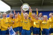 11 April 2015; WIT captain Edel Maher lifts the shield as her team-mates celebrate. WSCAI Intervarsities Shield Final, Waterford Institute of Technology v University of Limerick. Waterford IT, Waterford. Picture credit: Matt Browne / SPORTSFILE