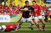 3 May 2008; Munster's Lifeimi Mafi is tackled by Llanelli Scarlets' Scot MacLeod. Magners League, Llanelli Scarlets v Munster. Stradey Park, Llanelli, Wales. Picture credit; Steve Pope / SPORTSFILE