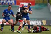12 April 2015; Zane Kirchner, Leinster, is tackled by Tyler Morgan, left, and Thomas Rhys Thomas, Newport Gwent Dragons. Guinness PRO12, Round 19, Newport Gwent Dragons v Leinster. Rodney Parade, Newport, Wales. Picture credit: Stephen McCarthy / SPORTSFILE
