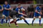 12 April 2015; Gordon D'arcy, Leinster, is tackled by Jonathan Evans, Newport Gwent Dragons. Guinness PRO12, Round 19, Newport Gwent Dragons v Leinster. Rodney Parade, Newport, Wales. Picture credit: Stephen McCarthy / SPORTSFILE