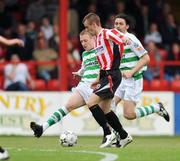 9 May 2008; Niall McGlynn, Derry City, is tackled by Corey Tracey, Shamrock Rovers. eircom League of Ireland Premier Division, Shamrock Rovers v Derry City, Tolka Park, Dublin. Picture credit: Stephen McCarthy / SPORTSFILE