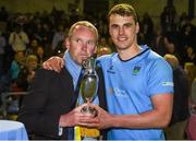 16 April 2015; Emmet MacMahon, UCD, is presented with the trophy by J.P. McDowell, President of UCD Rugby Club. Annual Rugby Colours, UCD v Trinity. UCD Bowl, Belfield, Dublin. Picture credit: Pat Murphy / SPORTSFILE