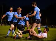 16 April 2015; UCD players, from left, Harry McNulty, Donagh Lawler and Barry Daly celebrate after team-mate Conall Doherty, second from right, scored the winning try. Annual Rugby Colours, UCD v Trinity. UCD Bowl, Belfield, Dublin. Picture credit: Pat Murphy / SPORTSFILE