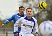 19 April 2015; Carl O'Brien, Liffey Wanderers, in action against Adam Beary, Northend United. FAI Aviva Junior Cup, Semi-Final, North End Utd v Liffey Wanderers. Ferrycarrig Park, Wexford. Picture credit: David Maher / SPORTSFILE