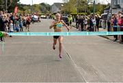 19 April 2015; Michelle Finn, Leevale AC, crosses the finishing line to win the Senior Womens relay. GloHealth Road Relay Championships of Ireland. Raheny, Dublin. Picture credit: Piaras O Midheach / SPORTSFILE