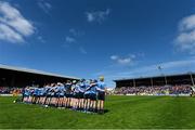 19 April 2015; The Dublin panel stand for a minute's silence ahead of the game for the late Dave Billings. Allianz Hurling League, Division 1 Semi-Final, Cork v Dublin. Nowlan Park, Kilkenny. Picture credit: Ramsey Cardy / SPORTSFILE