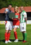 14 May 2008; Model Pippa O'Connor with David Partridge, St. Patrick's Athletic, left, and Paul Dunphy, Bray, at the announcement by the eircom League of Ireland about an exciting new initiative with Ticketmaster, the global leader in ticket sales, which will see tickets for all twelve Premier Division clubs made available through Ticketmaster outlets. Richmond Park, Dublin. Picture credit: Brian Lawless / SPORTSFILE  *** Local Caption ***