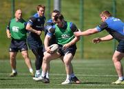 21 April 2015; Leinster's Cian Healy is tackled by Aaron Dundon, left, and Tadhg Furlong, right, during squad training. Rosemount, UCD, Dublin. Picture credit: Pat Murphy / SPORTSFILE