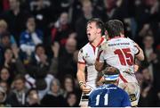 24 April 2015; Ulster's Craig Gilroy, left, celebrates his side's second try with team mates Louis Ludik, right and Paddy Jackson. Guinness PRO12, Round 20, Ulster v Leinster. Kingspan Stadium, Ravenhill Park, Belfast. Picture credit: Ramsey Cardy / SPORTSFILE