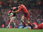 24 May 2008; Denis Leamy, Munster, is tackled by Fabien Pelous, Toulouse. Heineken Cup Final, Munster v Toulouse, Millennium Stadium, Cardiff, Wales. Picture credit: Brendan Moran / SPORTSFILE