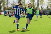 29 April 2015; Aoife Moran, Breaffy NS, Castlebar, Co. Mayo, in action against Rachel Egan, Cornafulla NS, Athlone, Co. Roscommon. SPAR FAI Primary School 5's Connacht Finals. Milebush Park, Castlebar, Mayo. Picture credit: Diarmuid Greene / SPORTSFILE