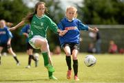 30 April 2015; Kirsten Hall, right, St Oliver Plunkett's NS, Malahide, Co. Dublin, in action against Claire Stuart, St Colmcille's NS, Gainstown, Co.Westmeath, during their Girls Section B match. SPAR FAI Primary School 5s Leinster Final, MDL Grounds, Trim Road, Navan, Co. Meath. Picture credit: Brendan Moran / SPORTSFILE