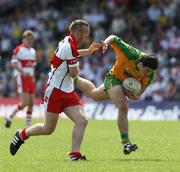 1 June 2008; Seamus Corcoran, Donegal, in action against Emmett McGuckin, Derry. ESB Ulster Minor Championship Quarter-Final, Donegal v Derry, MacCumhaill Park, Ballybofey, Co. Donegal. Picture credit: Oliver McVeigh / SPORTSFILE