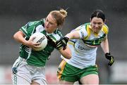 2 May 2015; Stephanie Carroll, Limerick, is tackled by Catherine Bennett, Offaly. TESCO HomeGrown Ladies National Football League, Division 4 Final, Limerick v Offaly. Parnell Park, Dublin. Picture credit: Ramsey Cardy / SPORTSFILE