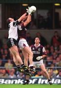 9 July 2000; Paul Durcan of Sligo in action against Sean O'Domhnaill of Galway during the Bank of Ireland Connacht Senior Football Championship Semi-Final match between Sligo and Galway at Markievicz Park in Sligo. Photo By Brendan Moran/Sportsfile