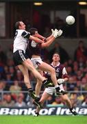 9 July 2000; Paul Durcan of Sligo in action against Sean O'Domhnaill of Galway during the Bank of Ireland Connacht Senior Football Championship Semi-Final match between Sligo and Galway at Markievicz Park in Sligo. Photo By Brendan Moran/Sportsfile