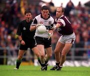 9 July 2000;John McPartland of Sligo in action against Ray Silke of Galway during the Bank of Ireland Connacht Senior Football Championship Semi-Final match between Sligo and Galway at Markievicz Park in Sligo. Photo By Brendan Moran/Sportsfile