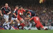 24 May 2008; Donncha O'Callaghan, Munster, is tackled by Fabien Pelous and Shaun Sowerby, 8, Toulouse. Heineken Cup Final, Munster v Toulouse, Millennium Stadium, Cardiff, Wales. Picture credit: Brendan Moran / SPORTSFILE