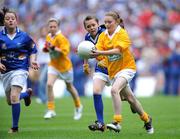 8 June 2008; Shannon Madden, St. Malachy's GNS, Co. Louth, in action against Shannon Cassin, left, and Jade Blake, Donaghmede, pictured participating in the Vhi Cúl Camps game played at half-time during the GAA Football Leinster Senior Championship Quarter-Final, Louth v Dublin, Croke Park, Dublin. Picture credit: Matt Browne / SPORTSFILE