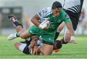 9 May 2015; Bunde Aki, Connacht, is tackled by Luciano Orquera, Zebre. Guinness PRO12, Round 21, Zebre v Connacht. Stadio XXV Aprile, Parma, Italy. Picture credit: Max Pratelli / SPORTSFILE