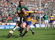 22 June 2008; Colin Lynch, Clare, under pressure from Limerick players Ollie Moran and Donie Ryan, fails to release the ball before crossing the sideline. GAA Hurling Munster Senior Championship Semi-Final, Limerick v Clare, Semple Stadium, Thurles, Co. Tipperary. Picture credit: Ray McManus / SPORTSFILE