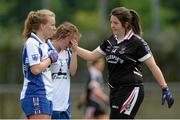 9 May 2015; Waterford's Hannah Landers, left, and Megan Dunford, are consoled by Sligo's Sinéad Ryan after the game. TESCO HomeGrown Ladies National Football League, Division 3 Final, Waterford v Sligo. Parnell Park, Dublin. Picture credit: Piaras Ó Mídheach / SPORTSFILE