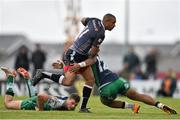 16 May 2015; Eli Walker, Ospreys, is tackled by Bundee Aki, Connacht. Guinness PRO12, Round 22, Connacht v Ospreys, Sportsground, Galway. Picture credit: Ramsey Cardy / SPORTSFILE