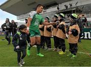 16 May 2015; Connacht's Miah Nikora with his daughter Myah, gives high fives to the ball boys after the game. Guinness PRO12, Round 22, Connacht v Ospreys, Sportsground, Galway. Picture credit: Ray Ryan / SPORTSFILE