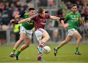 17 May 2015; Damien Comer, Galway, scores his side's first goal despite the tackle of Ronan Gallagher, Leitrim, looks dejected. Connacht GAA Football Senior Championship Quarter-Final, Leitrim v Galway. Parc Sean Mac Diarmada. Picture credit: Ray Ryan / SPORTSFILE