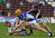 5 July 2008; Kerril Wade, Galway, in action against Laois' Patrick Mullaney and Cahir Healy, right. GAA Hurling All-Ireland Senior Championship Qualifier - Round 2, Galway v Laois, Pearse Stadium, Salthill, Galway. Picture credit: Pat Murphy / SPORTSFILE