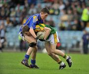 6 July 2008; Peter Crowley of Kerry in action against Darren Lowry of Tipperary during the ESB Munster Minor Football Championship Final match between Kerry and Tipperary at Pairc Ui Chaoimh in Cork. Photo by Stephen McCarthy/Sportsfile