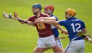 24 May 2015; Robbie Greville, Westmeath, in action against Matthew Whelan, centre, and Charles Dwyer, Laois. Leinster GAA Hurling Senior Championship Qualifier Group, Round 3, Laois v Westmeath. O'Moore Park, Portlaoise, Co. Laois. Picture credit: Brendan Moran / SPORTSFILE