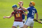 24 May 2015; Robbie Greville, Westmeath, in action against Matthew Whelan, centre, and Charles Dwyer, Laois. Leinster GAA Hurling Senior Championship Qualifier Group, Round 3, Laois v Westmeath. O'Moore Park, Portlaoise, Co. Laois. Picture credit: Brendan Moran / SPORTSFILE